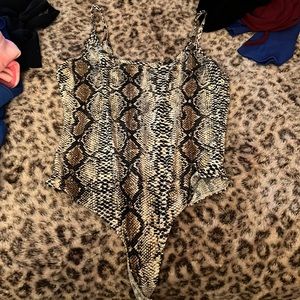 Snake skin open back body suit